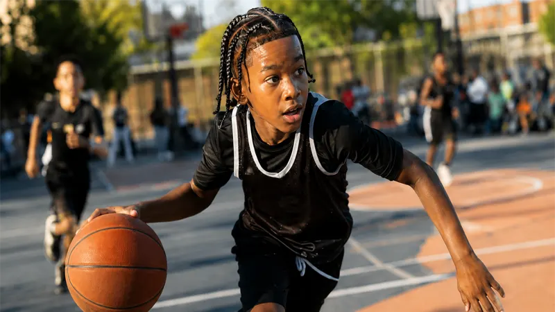 Active boy with braids during sports and play